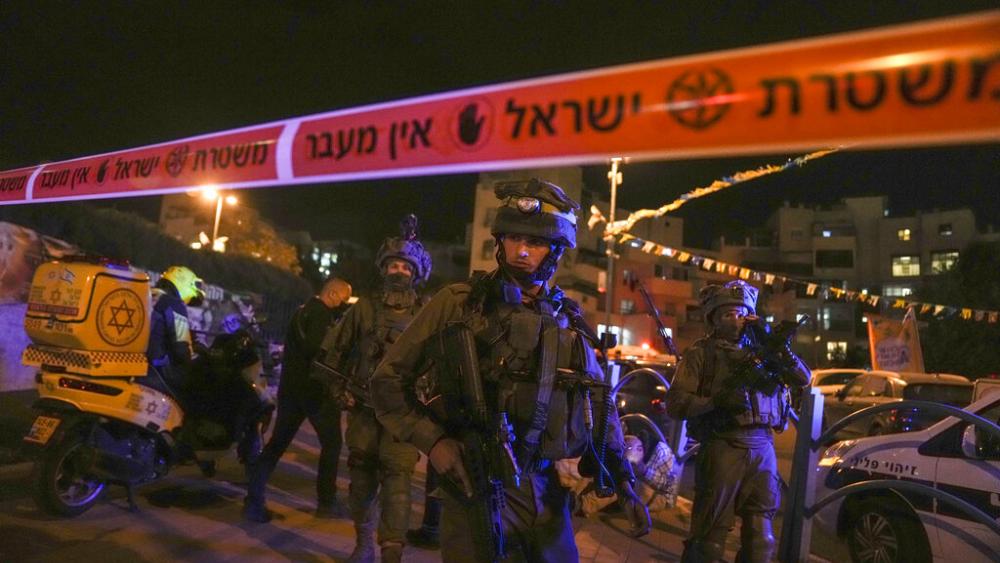 Israeli forces secure the area of a stabbing attack in the town of Elad, Israel, Thursday, May 5, 2022. (AP Photo)