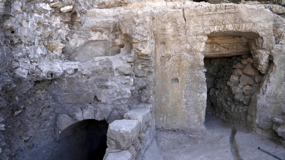 The site of a Jewish ritual bath or mikveh, left, discovered near the Western Wall in the Old City of Jerusalem, Sunday, July 17, 2022.  (AP Photo/Maya Alleruzzo)