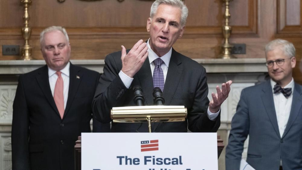 House Speaker Kevin McCarthy of R-Calif., speaks as House Minority Whip Rep. Steve Scalise, R.La., left, and Rep. Patrick McHenry, R-N.C., listen at a news conference after the House passed the debt ceiling bill. AP Photo