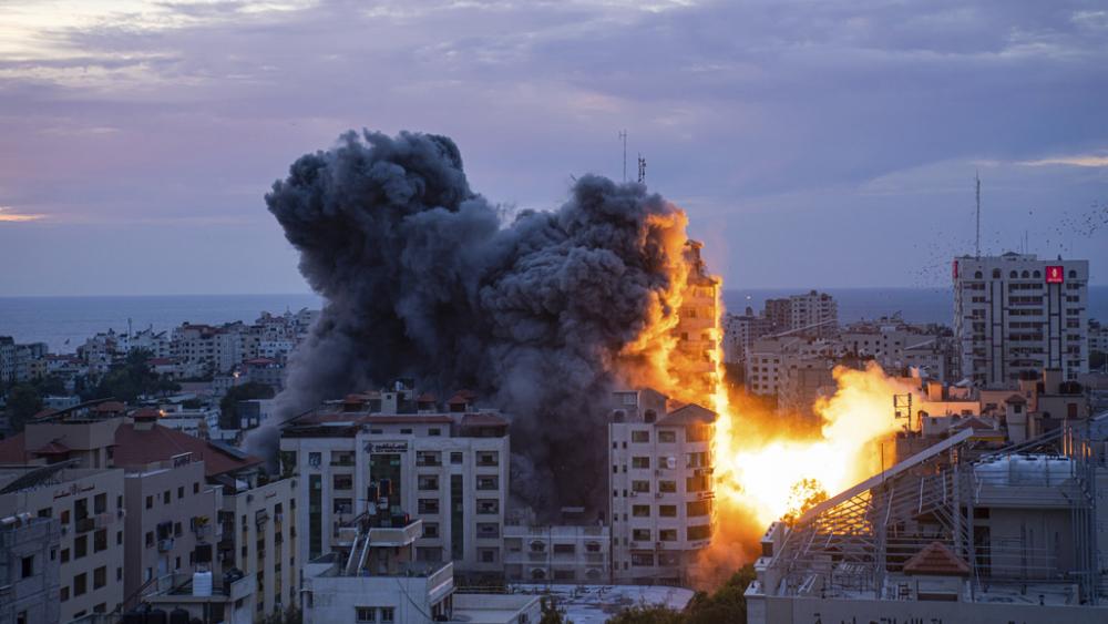 Fire and smoke rise following an Israeli airstrike in Gaza City, Saturday, Oct. 7, 2023. (AP Photo/Fatima Shbair)
