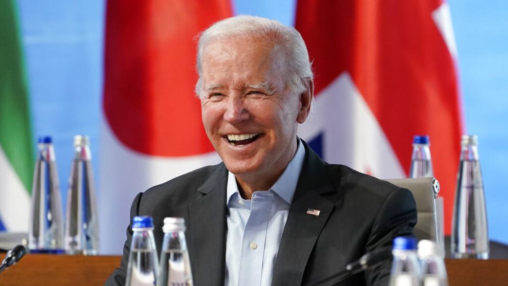 President Joe Biden laughs at the G7 Summit in Germany, June 27, 2022 (AP Photo/Susan Walsh, Pool)