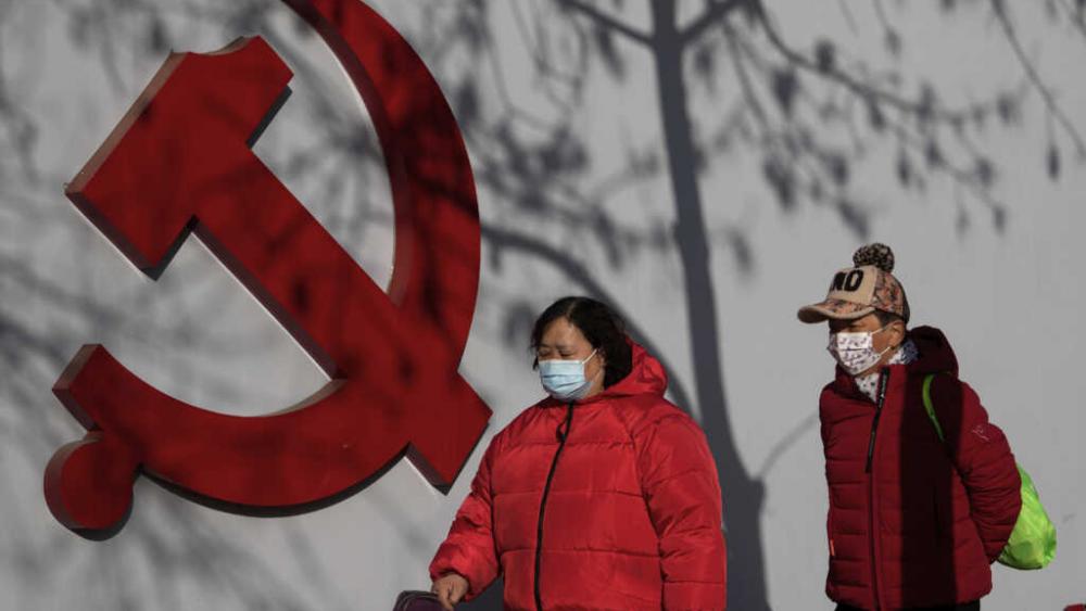 A Communist Party logo near a residential area in Beijing, March 2, 2023.  (AP Photo/Andy Wong)