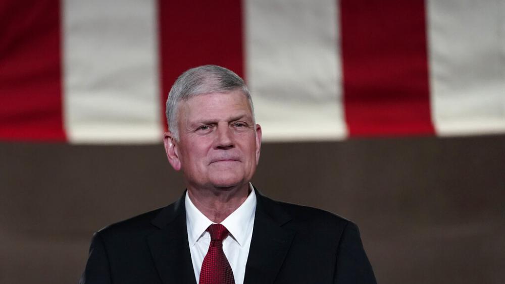 Evangelical leader Franklin Graham prepares to tape his prayer for the fourth day of the Republican National Convention from the Andrew W. Mellon Auditorium in Washington, Thursday, Aug. 27, 2020. (AP Photo/Susan Walsh)