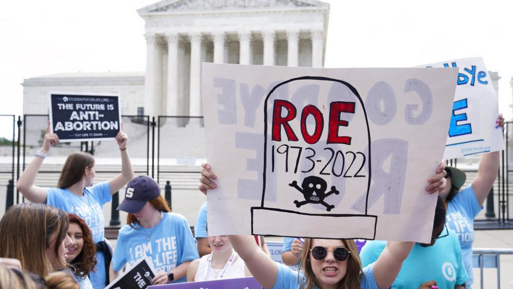 Demonstrators protest about abortion outside the Supreme Court in Washington, Friday, June 24, 2022.(AP Photo/Jacquelyn Martin)