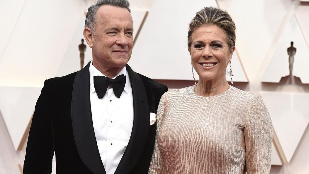  In this Feb. 9, 2020 file photo, Tom Hanks, left, and Rita Wilson arrive at the Oscars at the Dolby Theatre in Los Angeles (Photo by Jordan Strauss/Invision/AP, File)