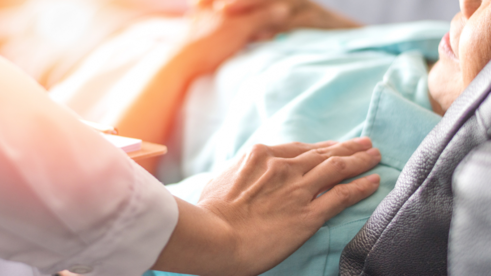 visiting sick person in bed