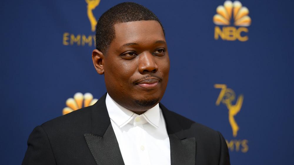 Michael Che arrives at the 70th Primetime Emmy Awards on Monday, Sept. 17, 2018, at the Microsoft Theater in Los Angeles. (Photo by Jordan Strauss/Invision/AP)