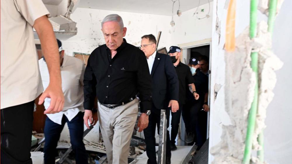 Prime Minister Benjamin Netanyahu visits the area of the missile strike in Bat Yam, Israel, on Sunday, June 15, 2025. Photo Credit: Avi Ohayon.
