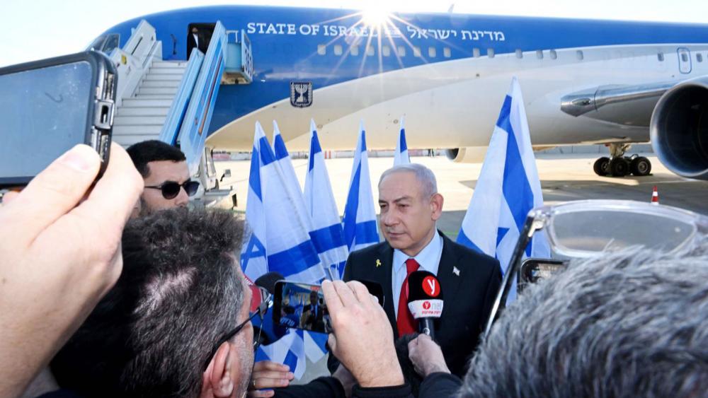 Israeli Prime Minister Benjamin Netanyahu discusses pending talks with President Trump before boarding a plane to Washington, Sunday, Febuary 2, 2025. Photo Credit: GPO