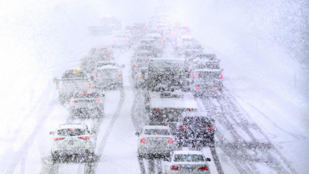 Traffic is stopped due to weather conditions on Route 93 South, March 14, 2023, in Londonderry, N.H. (AP Photo/Charles Krupa)