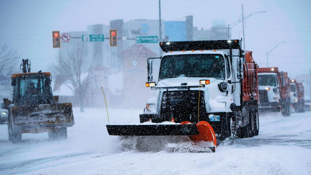 Snow and ice have blanketed large swaths of the U.S., prompting canceled flights, making driving perilous and reaching into areas as far south as Texas’ Gulf Coast. (AP Photo/Sue Ogrocki)