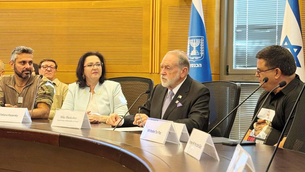 U.S. Ambassador to Israel Mike Huckabee addresses guests and Knesset members at the “Pray for the Peace of Jerusalem” event. Photo Credit: CBN News.