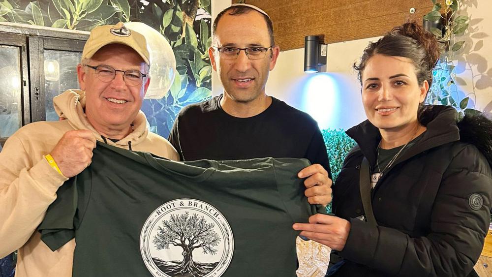 Orthodox Jew Jonathan Feldstein and Iranian Christian Marziyeh Amirizadeh partner in Root and Branch, a project bringing Jews and Christians together in Israel.