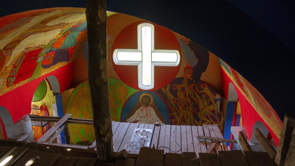 Christian Orthodox murals of the under construction new Church of the Intercession of the Blessed Virgin Mary in, Lypivka, near Lviv, Ukraine, April 30, 2024.  Two years ago it also provided physical refuge from horrors outside. (AP Photo/Francis Seco)